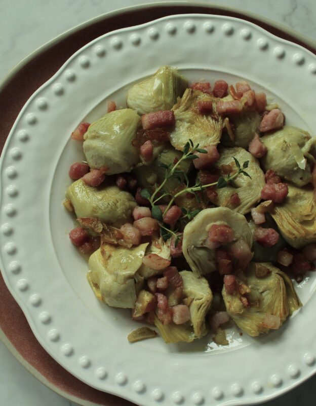 Sauteed artichokes cooked in olive oil twoandone